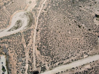 Beautiful one acre parcel of land located on the south end of on Taos Country Club in New Mexico - for sale on GolfHomes.com, golf home, golf lot