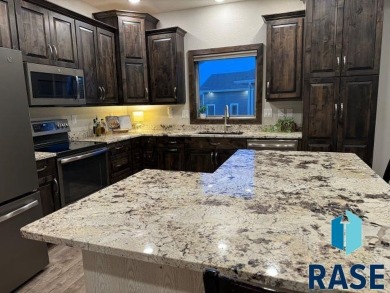 Discover this stunning 5-bedroom, 4-bathroom executive ranch on Wild Oak Golf Club in South Dakota - for sale on GolfHomes.com, golf home, golf lot