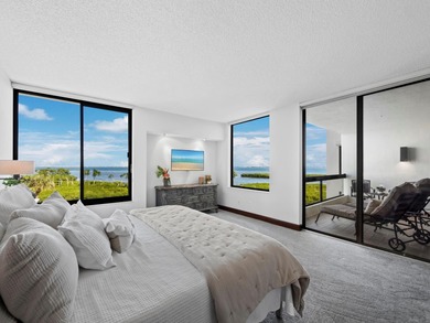 Sweeping bay views and refined comfort define this beautifully on Longboat Key Golf Club Resort in Florida - for sale on GolfHomes.com, golf home, golf lot