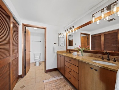 Sweeping bay views and refined comfort define this beautifully on Longboat Key Golf Club Resort in Florida - for sale on GolfHomes.com, golf home, golf lot