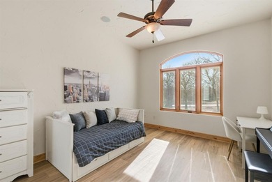 Poised beneath a canopy of mature trees on a gorgeous one-acre on Sugar Tree Golf and Country Club in Texas - for sale on GolfHomes.com, golf home, golf lot