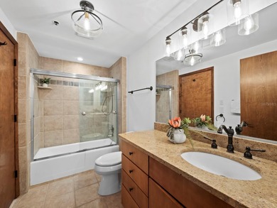 Sweeping bay views and refined comfort define this beautifully on Longboat Key Golf Club Resort in Florida - for sale on GolfHomes.com, golf home, golf lot