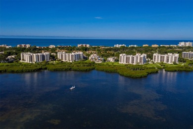 Sweeping bay views and refined comfort define this beautifully on Longboat Key Golf Club Resort in Florida - for sale on GolfHomes.com, golf home, golf lot