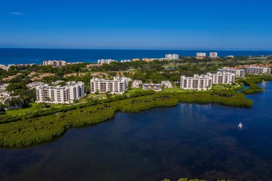 Sweeping bay views and refined comfort define this beautifully on Longboat Key Golf Club Resort in Florida - for sale on GolfHomes.com, golf home, golf lot