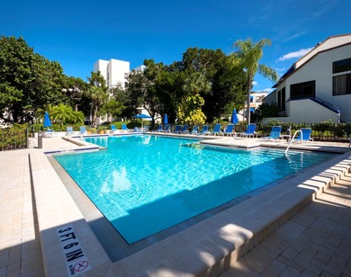 Sweeping bay views and refined comfort define this beautifully on Longboat Key Golf Club Resort in Florida - for sale on GolfHomes.com, golf home, golf lot