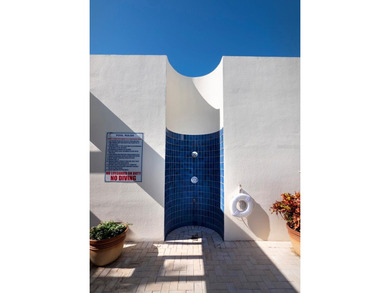 Sweeping bay views and refined comfort define this beautifully on Longboat Key Golf Club Resort in Florida - for sale on GolfHomes.com, golf home, golf lot