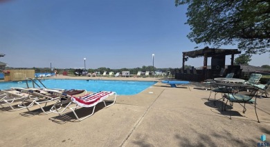 Discover this stunning 5-bedroom, 4-bathroom executive ranch on Wild Oak Golf Club in South Dakota - for sale on GolfHomes.com, golf home, golf lot