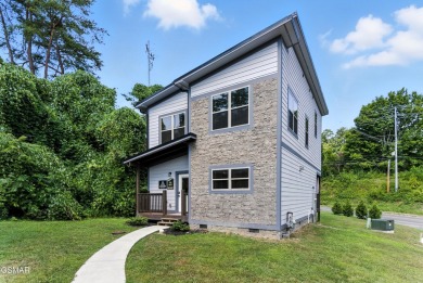Location, charm, and rental potential all wrapped into one! on Gatlinburg Golf Course in Tennessee - for sale on GolfHomes.com, golf home, golf lot