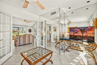 Welcome to this inviting 2-bedroom, 2-bath, single-level on Palm Desert Resort Country Club in California - for sale on GolfHomes.com, golf home, golf lot