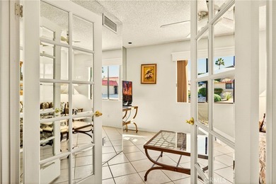 Welcome to this inviting 2-bedroom, 2-bath, single-level on Palm Desert Resort Country Club in California - for sale on GolfHomes.com, golf home, golf lot