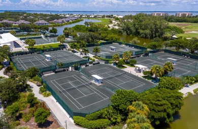 Sweeping bay views and refined comfort define this beautifully on Longboat Key Golf Club Resort in Florida - for sale on GolfHomes.com, golf home, golf lot