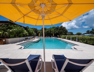 Sweeping bay views and refined comfort define this beautifully on Longboat Key Golf Club Resort in Florida - for sale on GolfHomes.com, golf home, golf lot