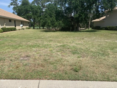 Ready to build, cleared, extra long lot in 24/7 guard gated on Plantation Bay Golf and Country Club in Florida - for sale on GolfHomes.com, golf home, golf lot
