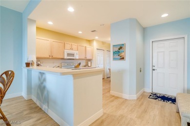 Step through the screened entry to luxury vinyl tile plank on Lexington Country Club in Florida - for sale on GolfHomes.com, golf home, golf lot