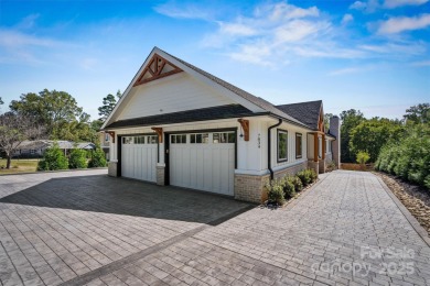 Waterfront custom home w/ one-of-a-kind architecture is a must on Westport Golf Club in North Carolina - for sale on GolfHomes.com, golf home, golf lot