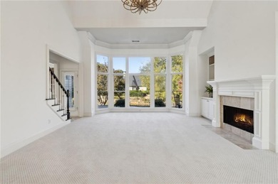 Welcome to your dream home nestled in the breathtaking community on Atlanta Athletic Club in Georgia - for sale on GolfHomes.com, golf home, golf lot