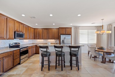 This stunning Mateo model is perfectly positioned on a premium on Saddlebrooke Ranch Golf Club in Arizona - for sale on GolfHomes.com, golf home, golf lot