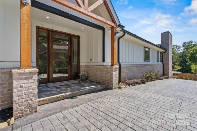 Waterfront custom home w/ one-of-a-kind architecture is a must on Westport Golf Club in North Carolina - for sale on GolfHomes.com, golf home, golf lot