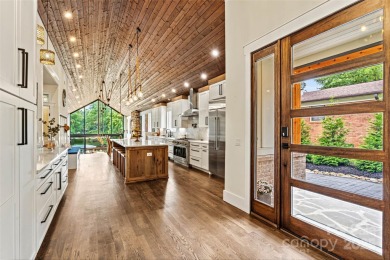 Waterfront custom home w/ one-of-a-kind architecture is a must on Westport Golf Club in North Carolina - for sale on GolfHomes.com, golf home, golf lot