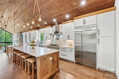 Waterfront custom home w/ one-of-a-kind architecture is a must on Westport Golf Club in North Carolina - for sale on GolfHomes.com, golf home, golf lot
