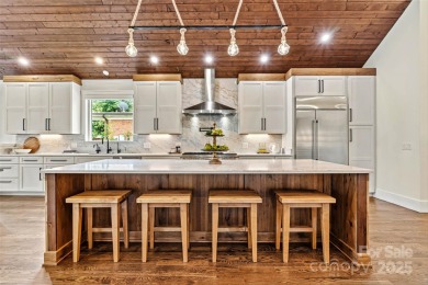 Waterfront custom home w/ one-of-a-kind architecture is a must on Westport Golf Club in North Carolina - for sale on GolfHomes.com, golf home, golf lot