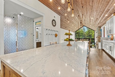 Waterfront custom home w/ one-of-a-kind architecture is a must on Westport Golf Club in North Carolina - for sale on GolfHomes.com, golf home, golf lot