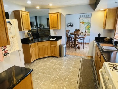 Looking for a turn-key home, ready day one? Welcome to 9612 on Canadian Lakes Country Club-The Royal Course in Michigan - for sale on GolfHomes.com, golf home, golf lot