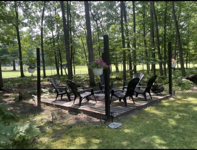 Looking for a turn-key home, ready day one? Welcome to 9612 on Canadian Lakes Country Club-The Royal Course in Michigan - for sale on GolfHomes.com, golf home, golf lot