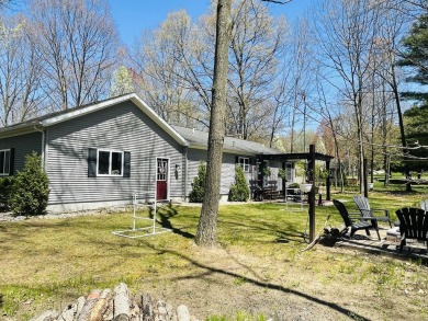 Looking for a turn-key home, ready day one? Welcome to 9612 on Canadian Lakes Country Club-The Royal Course in Michigan - for sale on GolfHomes.com, golf home, golf lot