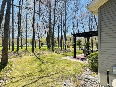 Looking for a turn-key home, ready day one? Welcome to 9612 on Canadian Lakes Country Club-The Royal Course in Michigan - for sale on GolfHomes.com, golf home, golf lot