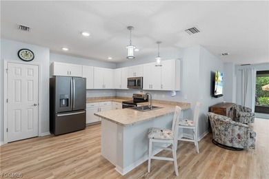 Experience the pride of ownership in this exquisite 2 bedroom, 2 on Twin Isles Country Club in Florida - for sale on GolfHomes.com, golf home, golf lot