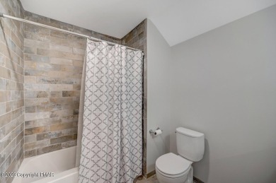 Gorgeous fully renovated farmhouse on over one acre fronting the on Buck Hill Golf Club  in Pennsylvania - for sale on GolfHomes.com, golf home, golf lot