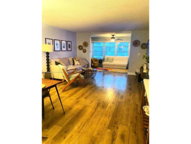 Discover this beautifully maintained 2BR 2BA condo in the on Oriole Golf and Tennis Club in Florida - for sale on GolfHomes.com, golf home, golf lot