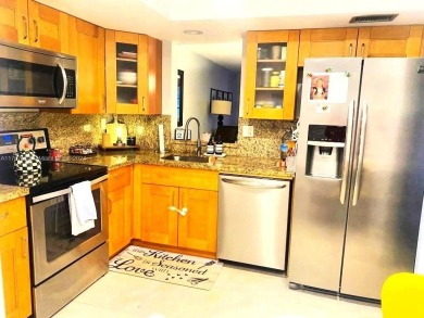 Discover this beautifully maintained 2BR 2BA condo in the on Oriole Golf and Tennis Club in Florida - for sale on GolfHomes.com, golf home, golf lot
