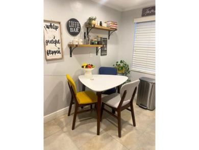 Discover this beautifully maintained 2BR 2BA condo in the on Oriole Golf and Tennis Club in Florida - for sale on GolfHomes.com, golf home, golf lot
