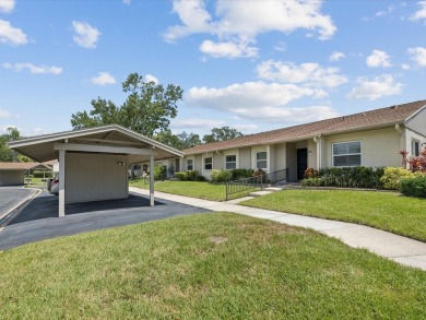 Welcome to this stunning, fully renovated 4 bedroom, 2 bathroom on East Lake Woodlands Country Club in Florida - for sale on GolfHomes.com, golf home, golf lot