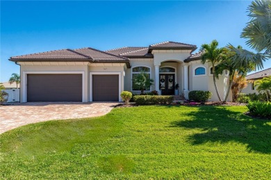 Luxury waterfront living awaits in this custom residence located on Twin Isles Country Club in Florida - for sale on GolfHomes.com, golf home, golf lot