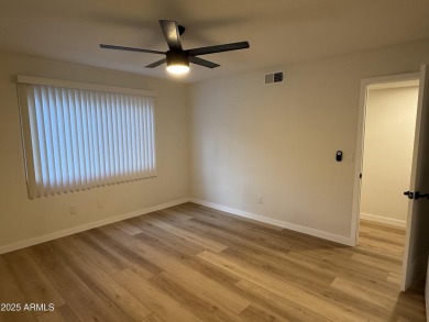 Meticulously remodeled 3-bedroom, 2-bathroom home on the Aspen on Aspen Valley Golf Club in Arizona - for sale on GolfHomes.com, golf home, golf lot