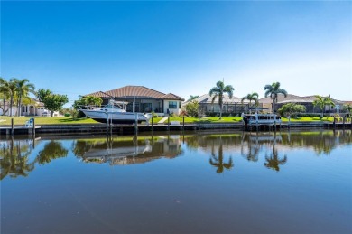 Luxury waterfront living awaits in this custom residence located on Twin Isles Country Club in Florida - for sale on GolfHomes.com, golf home, golf lot