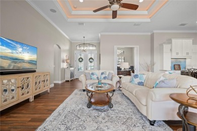 Luxury waterfront living awaits in this custom residence located on Twin Isles Country Club in Florida - for sale on GolfHomes.com, golf home, golf lot