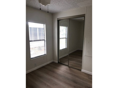 Stunning 2 Bed / 2 Bath Remodeled Home with Gorgeous Water Views on The Meadows At Countrywood in Florida - for sale on GolfHomes.com, golf home, golf lot