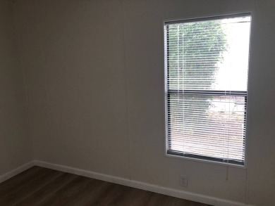 Stunning 2 Bed / 2 Bath Remodeled Home with Gorgeous Water Views on The Meadows At Countrywood in Florida - for sale on GolfHomes.com, golf home, golf lot