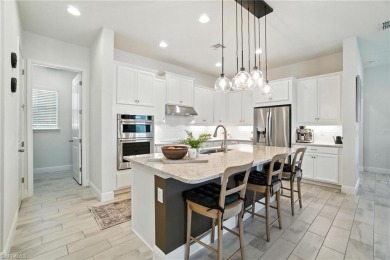 Modern, move-in ready, and effortlessly fresh--this North Naples on Vanderbilt Country Club in Florida - for sale on GolfHomes.com, golf home, golf lot