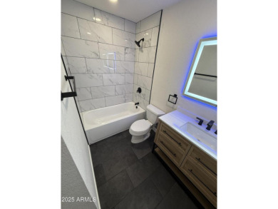 Meticulously remodeled 3-bedroom, 2-bathroom home on the Aspen on Aspen Valley Golf Club in Arizona - for sale on GolfHomes.com, golf home, golf lot