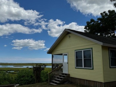 Breathtaking views!!!!  This two bedroom, one bathroom home on Captains Cove Golf and Yacht Club in Virginia - for sale on GolfHomes.com, golf home, golf lot