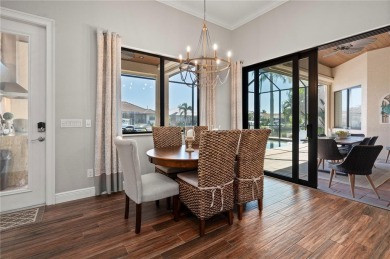 Luxury waterfront living awaits in this custom residence located on Twin Isles Country Club in Florida - for sale on GolfHomes.com, golf home, golf lot
