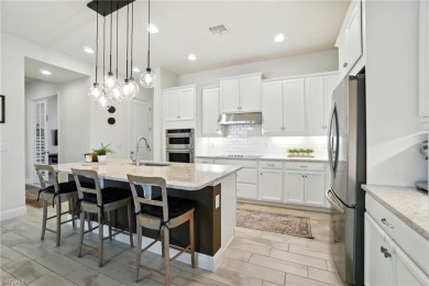 Modern, move-in ready, and effortlessly fresh--this North Naples on Vanderbilt Country Club in Florida - for sale on GolfHomes.com, golf home, golf lot