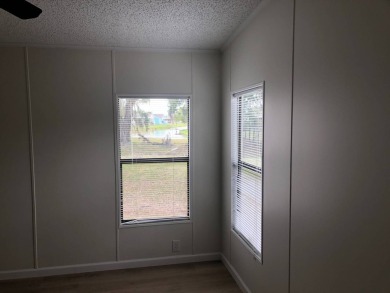 Stunning 2 Bed / 2 Bath Remodeled Home with Gorgeous Water Views on The Meadows At Countrywood in Florida - for sale on GolfHomes.com, golf home, golf lot