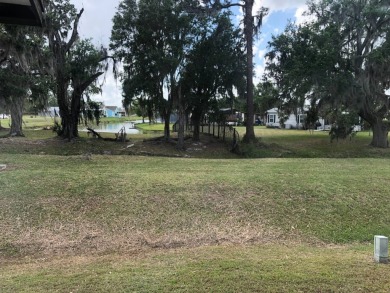 Stunning 2 Bed / 2 Bath Remodeled Home with Gorgeous Water Views on The Meadows At Countrywood in Florida - for sale on GolfHomes.com, golf home, golf lot