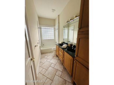 STUNNING PANORAMIC VIEWS greet you in this PREMIER on Queens Harbour Yacht and Country Club in Florida - for sale on GolfHomes.com, golf home, golf lot